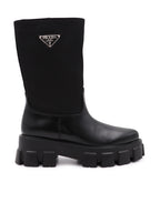Bottes Bottes à logo Prada Noir Femme
