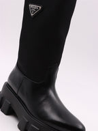 Bottes Bottes à logo Prada Noir Femme