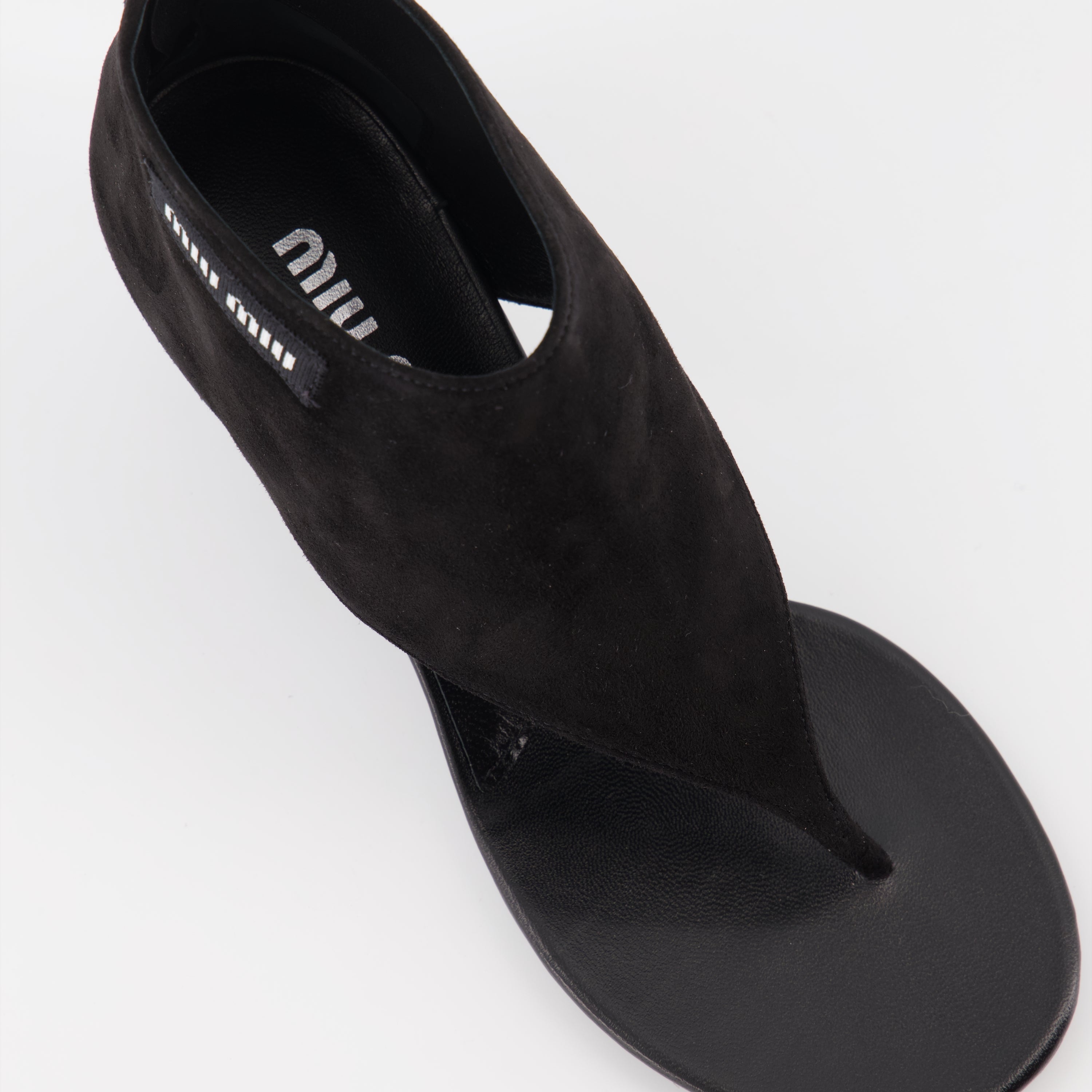 Bottines tongs en cuir noir