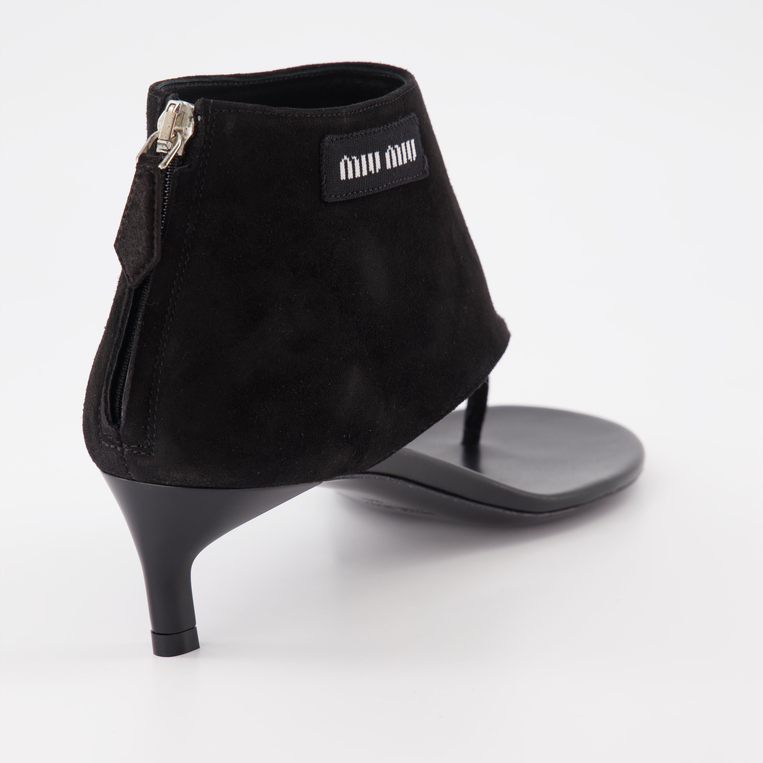 Bottines tongs en cuir noir