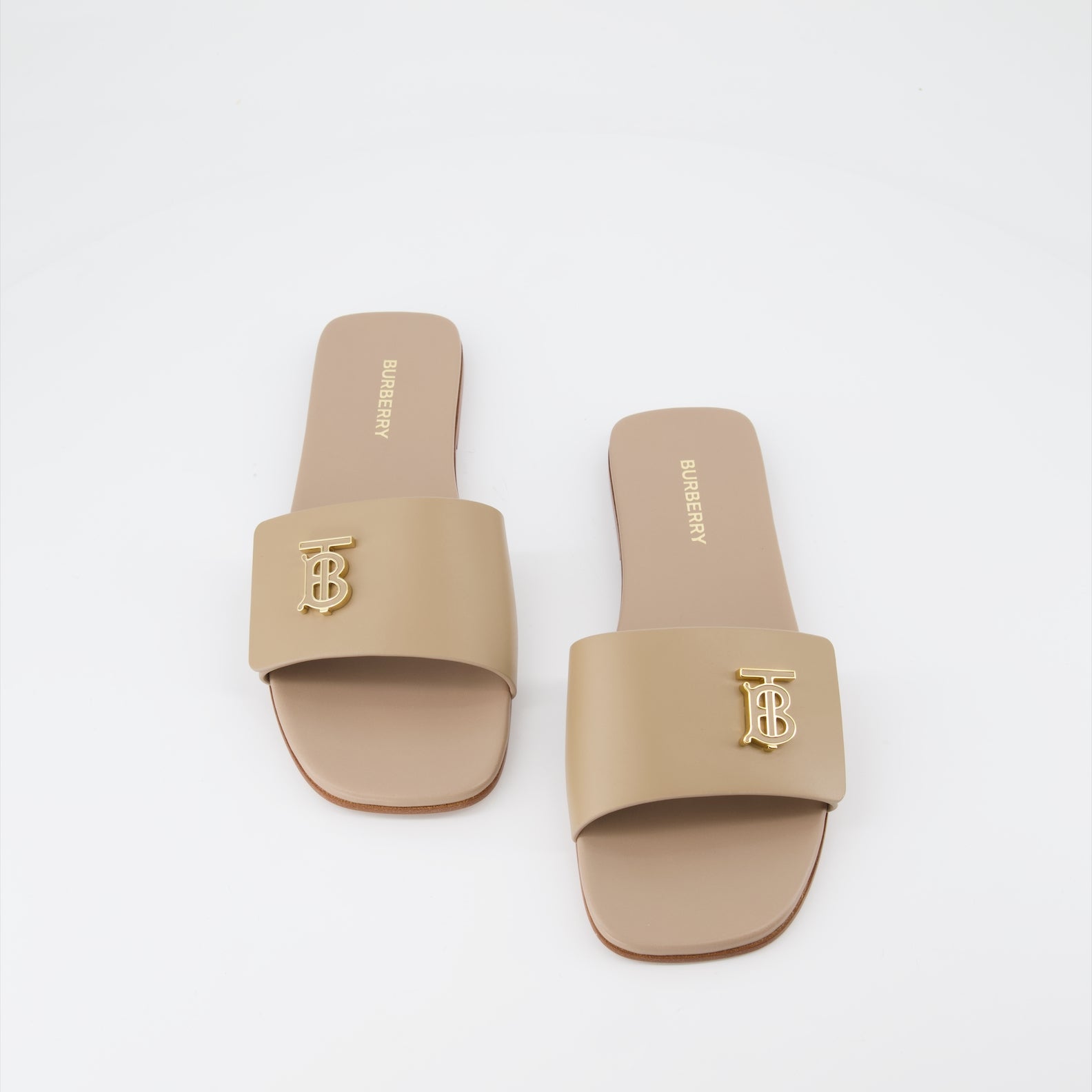 Chaussures ouvertes Claquettes en cuir Burberry Beige Femme