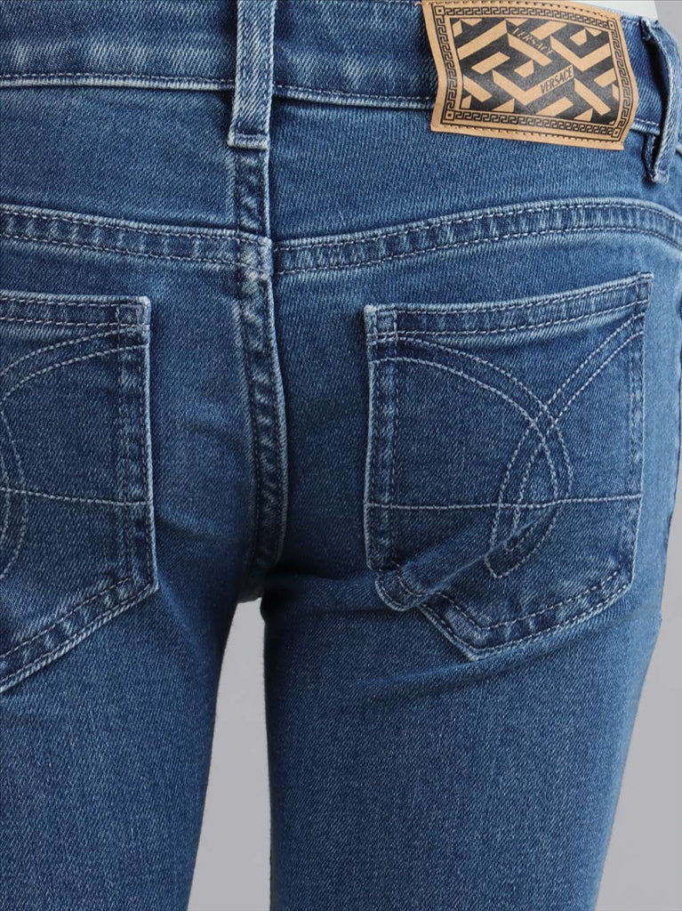 Bekleidung Jean à coupe évasée Versace Blau Kinder