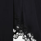 Jupe asymétrique à bords en dentelle