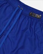 Beachwear Logo plaque swim shorts Moschino Blue Man