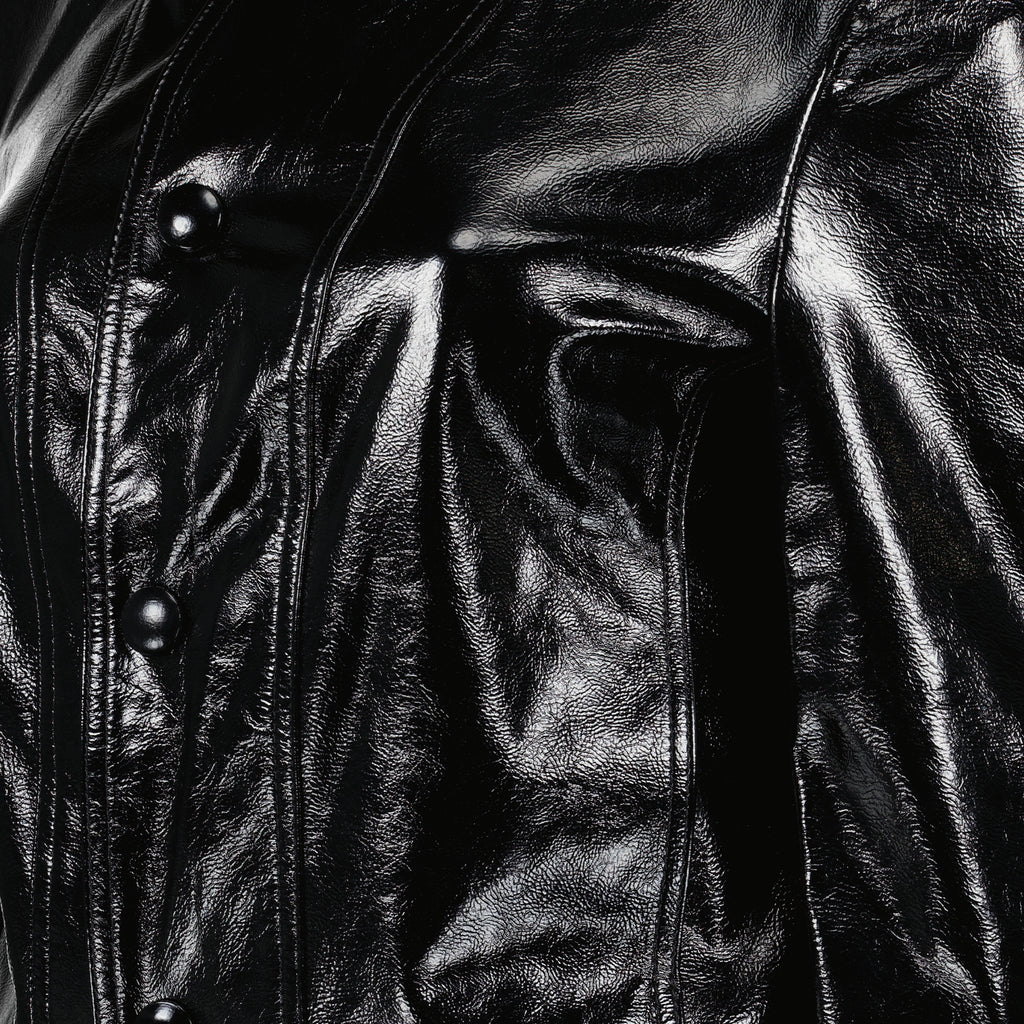 Veste en vinyle noir